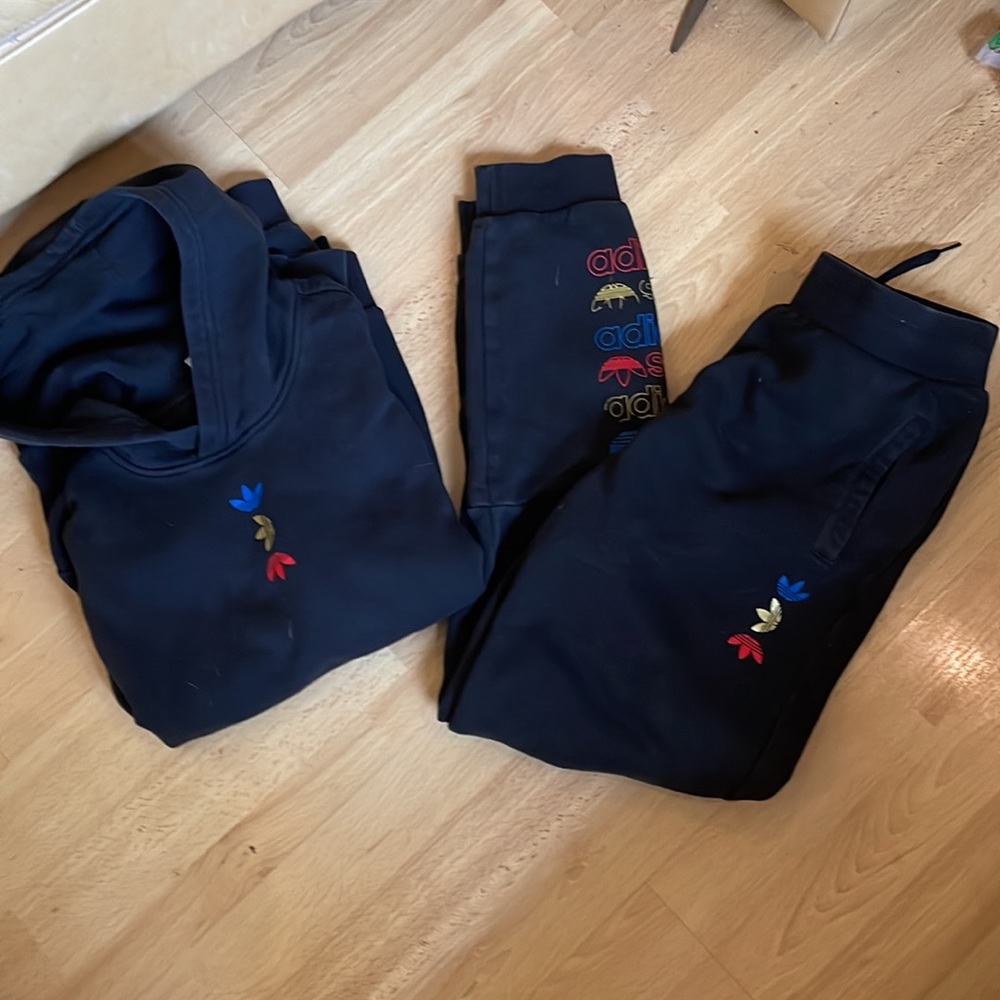 Adidas track suit look at all pics . Top and bottom